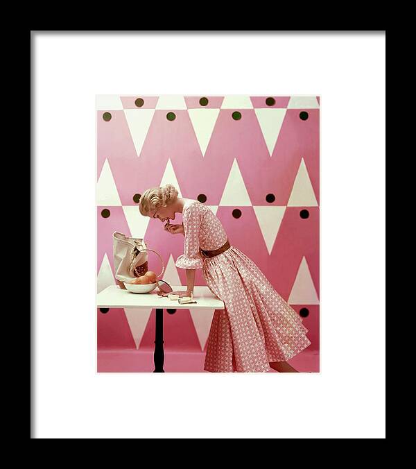Fashion Framed Print featuring the photograph Model Putting On Lipstick by Richard Rutledge