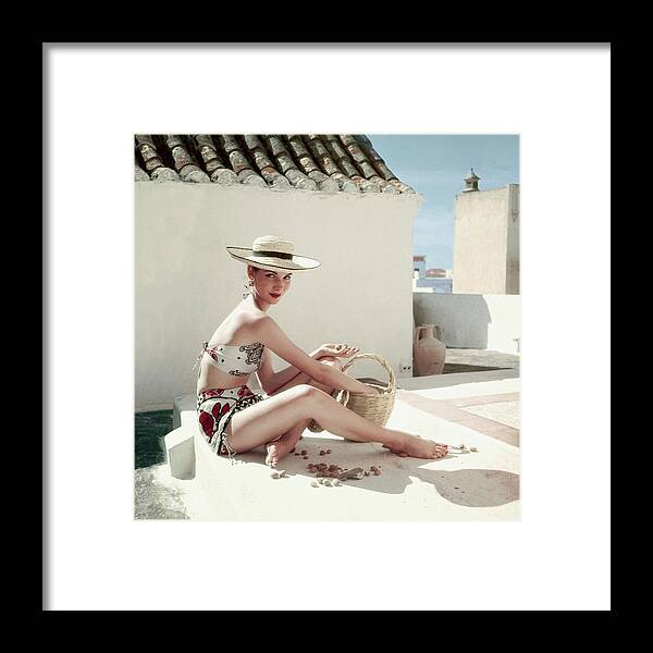 Fashion Framed Print featuring the photograph Model Wearing A Calypso Patterned Bikini by Henry Clarke