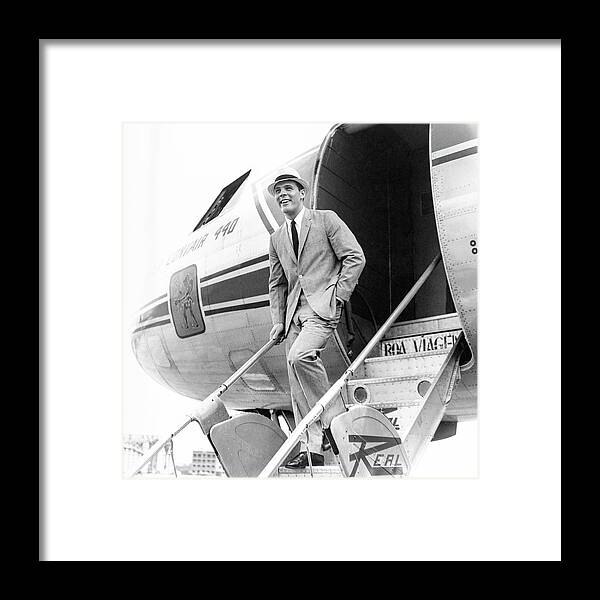 Airplane Framed Print featuring the photograph Model Wearing A Deansgate Suit by Richard Waite