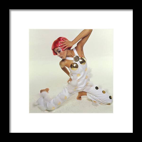 Fashion Framed Print featuring the photograph Model Wearing An Andre Courreges Jumpsuit by Bert Stern