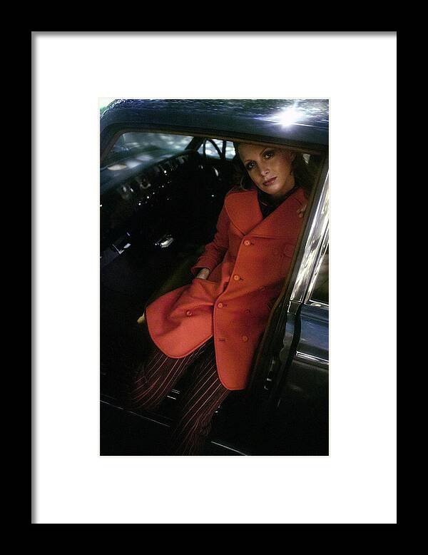 Auto Framed Print featuring the photograph Model Wearing An Emanuel Ungaro Ensemble by Arnaud de Rosnay