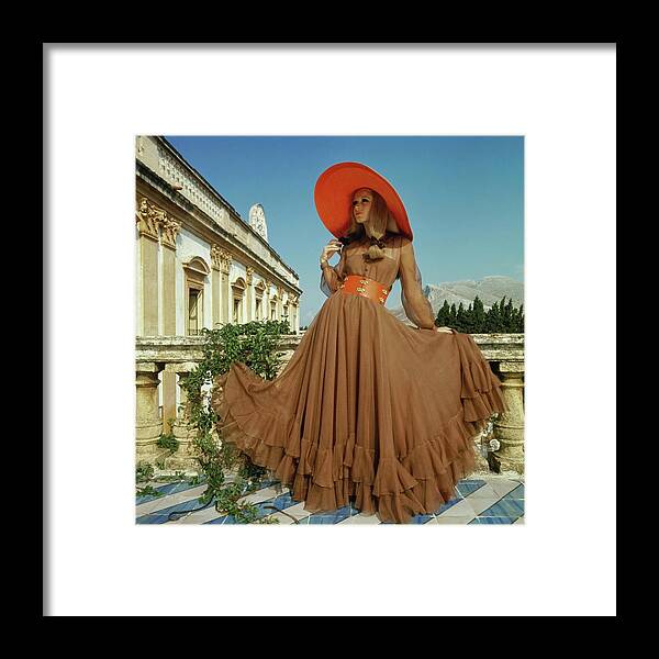 Fashion Framed Print featuring the photograph Model Wearing Oscar De La Renta by Henry Clarke