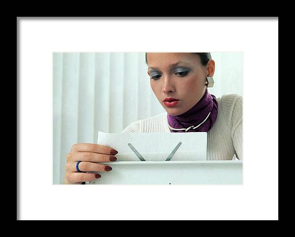 Fashion Framed Print featuring the photograph Model Wearing Revlon Nail Polish By A Typewriter by Kourken Pakchanian