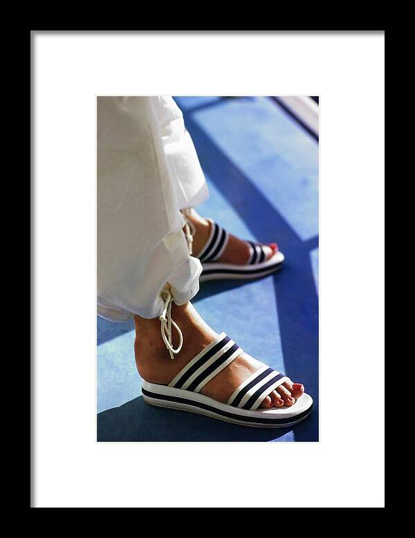 Fashion Framed Print featuring the photograph Model's Feet Wearing Pierre Cardin Sandals by Arthur Elgort