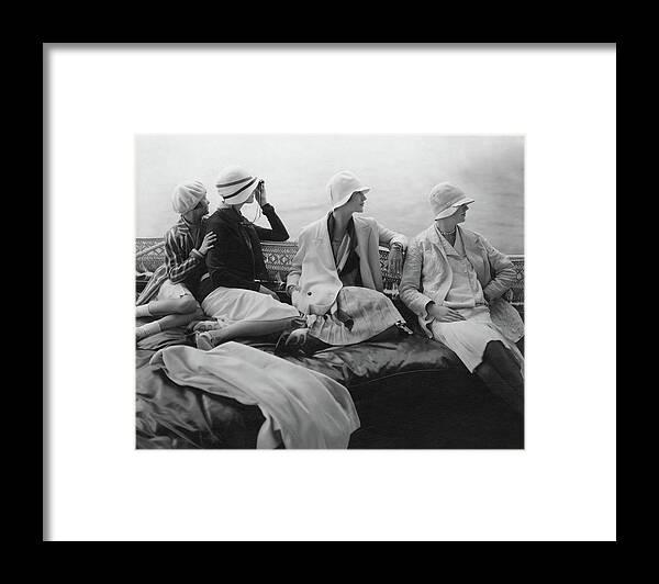Accessories Boat Exterior Fashion Hat Hobbies Model Personality Water Outdoors Daytime Four People People Yacht Sitting Headgear Looking Away Lee Miller Hanna Lee Sherman 20-24 Years Young Adult 20s Adult Female Young Woman Young Adult Woman George Baher #condenastvoguephotograph July 15th 1928 Framed Print featuring the photograph Models On A Yacht by Edward Steichen