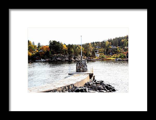 Waterfront Fjords Fjord Water Nature Landscape Trees View Outdoors Jetty Norway Scandinavia Europe Grey Stonework Brown Atumumn Fall Green Blue Sky White Black Stone Rocks Orange Yellow Beige Sement Framed Print featuring the photograph Molo by the Norwegian Fjord by Jeanette Rode Dybdahl