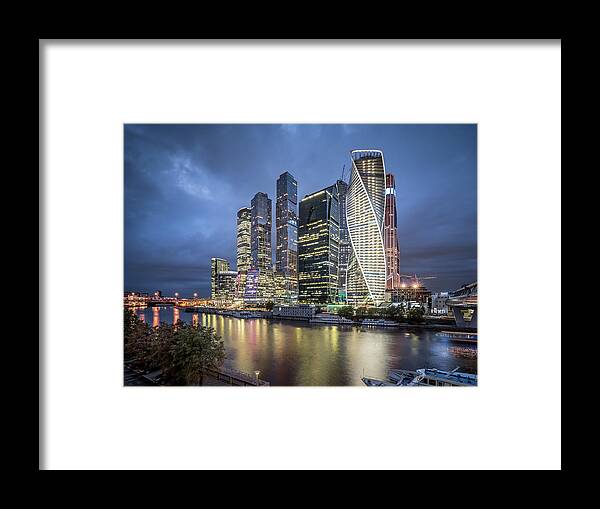 Downtown District Framed Print featuring the photograph Moscow Skyline At Night by Yongyuan Dai