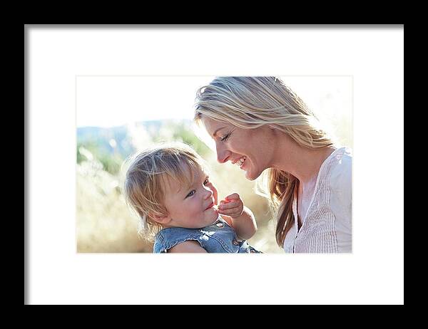 Two People Framed Print featuring the photograph Mother And Daughter Laughing by Ruth Jenkinson