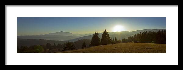 Mountain Framed Print featuring the photograph Mountain panorama at sunset with beautiful sun glare by Vlad Baciu