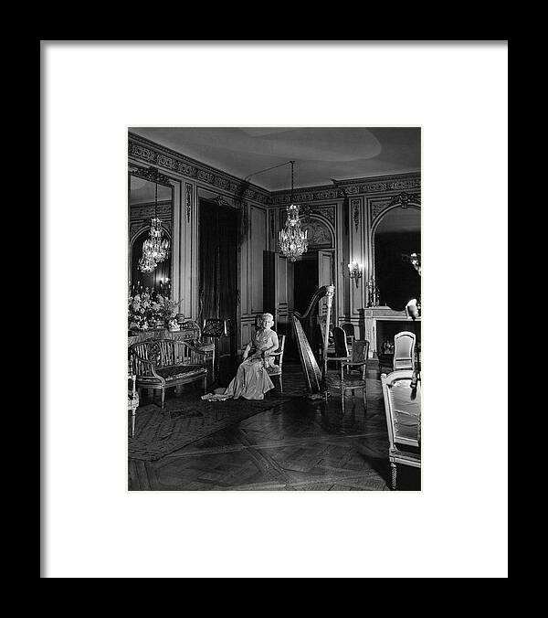 Home Framed Print featuring the photograph Mrs. Cornelius Sitting In A Lavish Music Room by Cecil Beaton