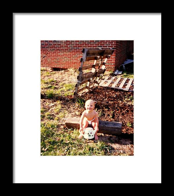 Framed Print featuring the photograph My Lil Gardener by Kelly Awad