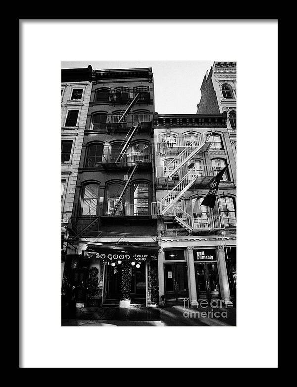 Usa Framed Print featuring the photograph Narrow Buildings Shopfronts With External Fire Escapes Soho New York City by Joe Fox