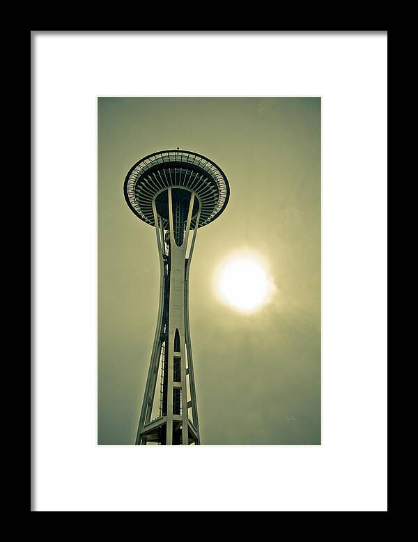 Symbolizes Framed Print featuring the photograph Needle in a cloud stack by Eti Reid