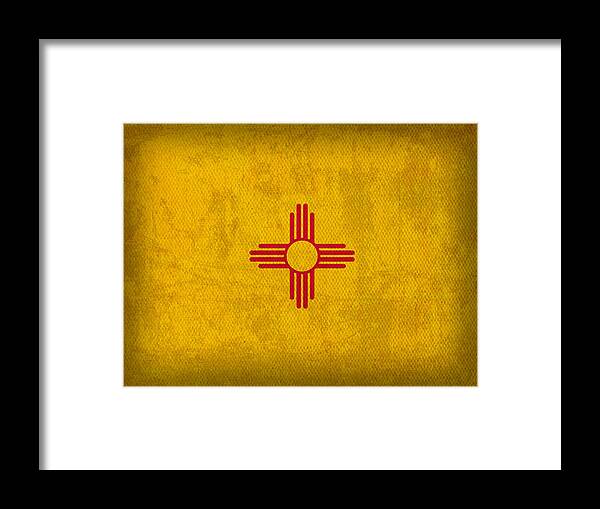 New Mexico State Flag Art On Worn Canvas Framed Print featuring the mixed media New Mexico State Flag Art on Worn Canvas by Design Turnpike