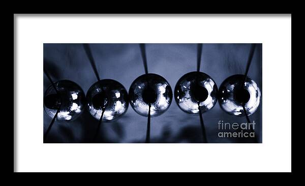 Accuracy Framed Print featuring the photograph Newtons cradle by Stelios Kleanthous