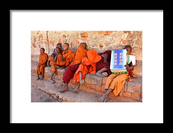 śrāmaṇera Framed Print featuring the photograph Novice Buddhist Monks by Venetia Featherstone-Witty