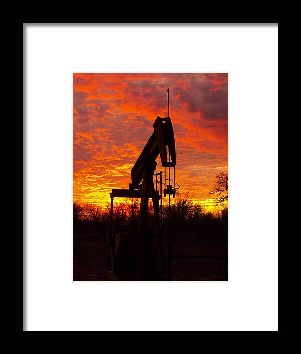 Oil Pump Framed Print featuring the photograph Oil Pump Beneath A Blazing Sky by James Granberry