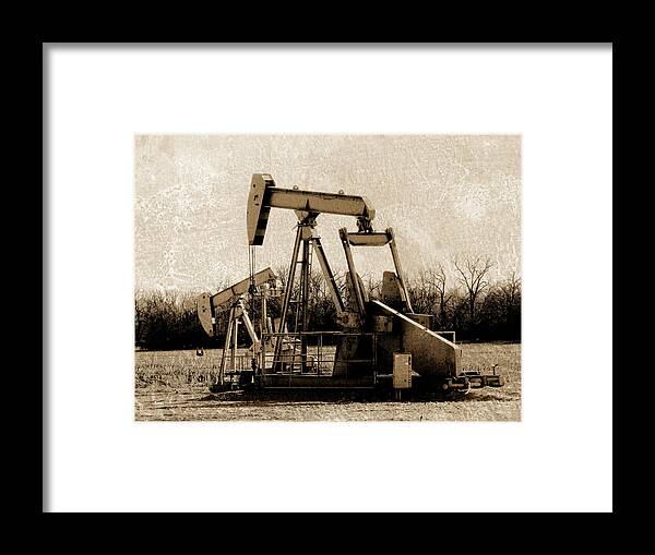 Oil Pump Framed Print featuring the digital art Oil Pump Jack in Sepia by Ann Powell