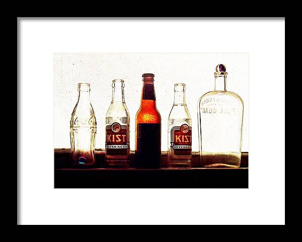 Old Bottles Framed Print featuring the photograph Old Bottles by Joy Nichols