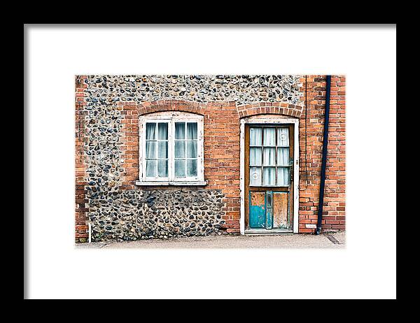 Background Framed Print featuring the photograph Old cottage by Tom Gowanlock