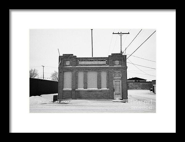 Old Framed Print featuring the photograph old government telephones telephone exchange building Kamsack Saskatchewan Canada by Joe Fox