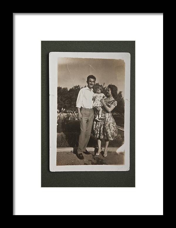 Heterosexual Couple Framed Print featuring the photograph Old picture of family posing together by Eyenigelen