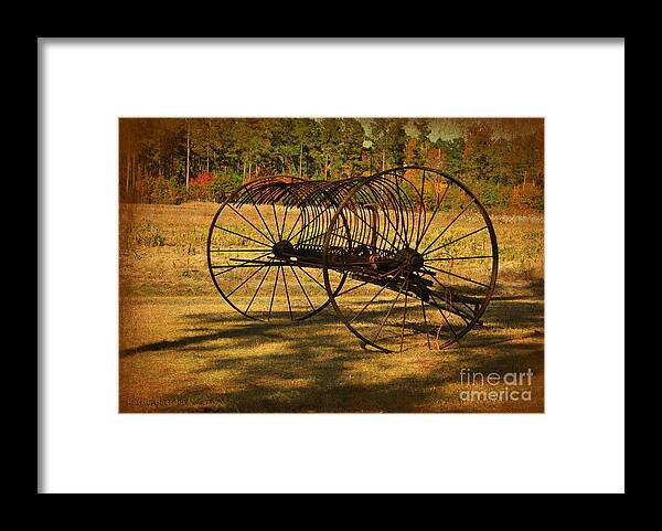 Hay Rake Framed Print featuring the photograph Old Rusty Hay Rake by Kathy Baccari