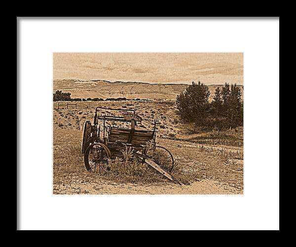 Aged Framed Print featuring the photograph Old West Wagon by Leland D Howard