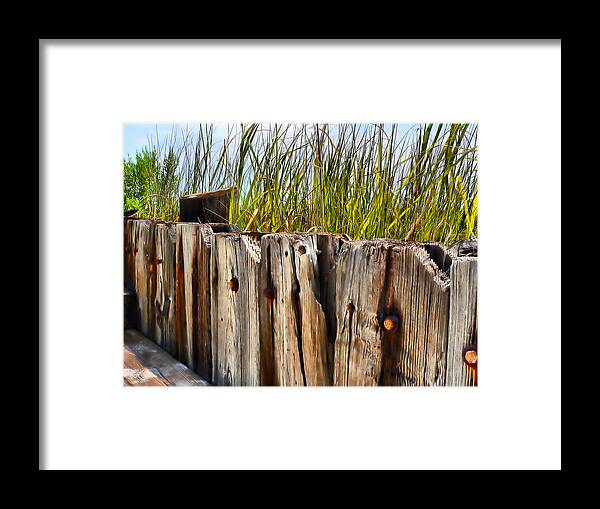 Old Wood Structure Framed Print featuring the photograph Old Wood Structure Beachside by Kathy K McClellan
