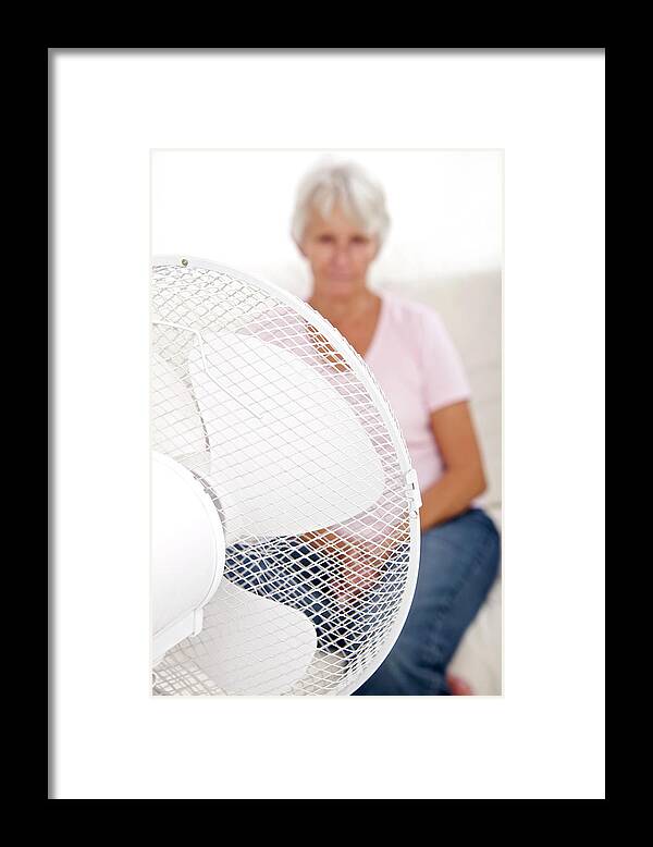People Framed Print featuring the photograph Older Lady With An Electric Fan by Lea Paterson