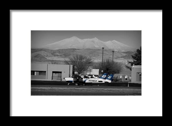 Ernest A. Love Field Framed Print featuring the photograph On the Flight Line Below the Volcano by Aaron Burrows