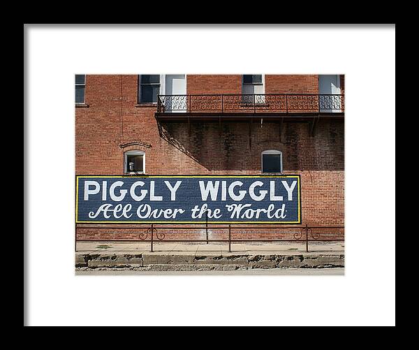 Piggly Wiggly Framed Print featuring the photograph One Famous Pig by Jeff Mize