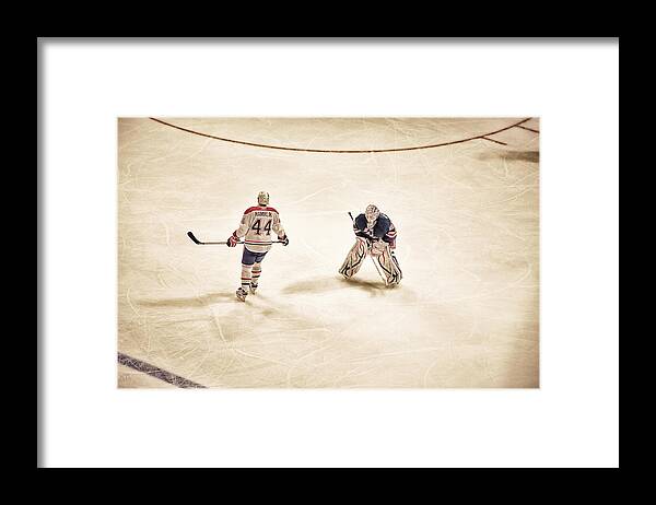 Hockey Framed Print featuring the photograph Opponents by Karol Livote