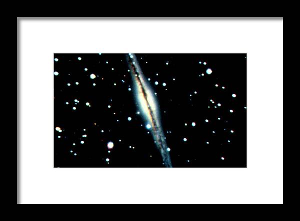 Ngc 891 Framed Print featuring the photograph Optical Ccd Image Of The Spiral Galaxy Ngc 891 by Dr Rudolph Schild/science Photo Library