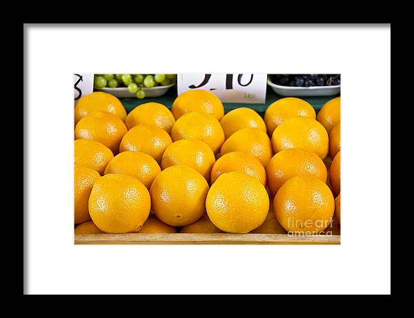 Oranges Framed Print featuring the photograph Oranges 1 by David Doucot