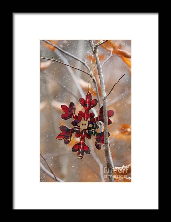 Antique Framed Print featuring the photograph Ornament hanging on branch with snow falling by Sandra Cunningham