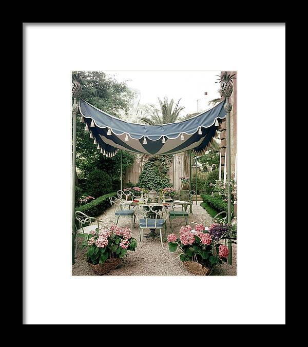 Flowers Framed Print featuring the photograph Outdoor Furniture On A Terrace by Tom Leonard