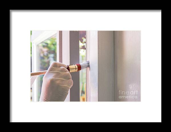 House Painter Framed Print featuring the photograph Painting with white by Patricia Hofmeester