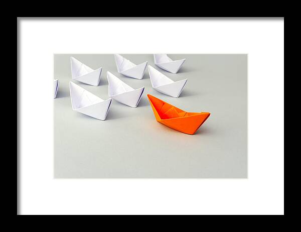Following Framed Print featuring the photograph Paper Boat Business Leadership Concept by Nora Carol Photography