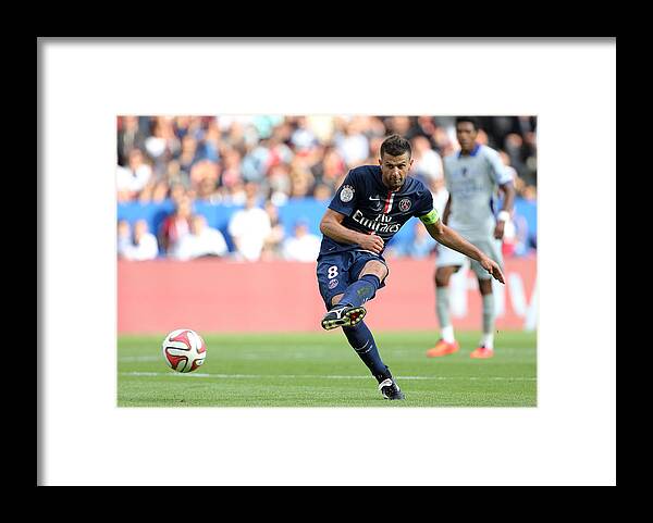 Motion Framed Print featuring the photograph Paris Saint-Germain FC v SC Bastia- Ligue 1 by Jean Catuffe