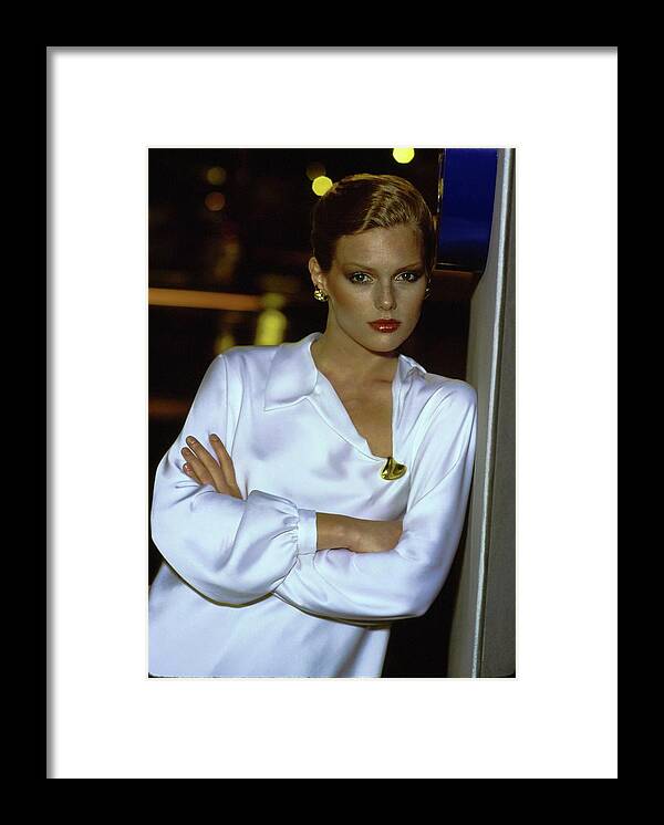 #condenastvoguephotograph Framed Print featuring the photograph Patti Hansen Wearing A White Top by Arthur Elgort