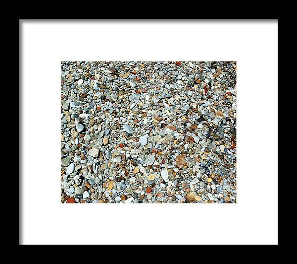 Abstract Framed Print featuring the photograph Pebbles in the Sand by Sabrina L Ryan