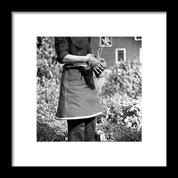 Fashion Framed Print featuring the photograph Person Wearing A Gardening Apron by Frances McLaughlin-Gill