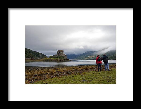 Photographers At Eilean Dunan Castel Framed Print featuring the photograph Photographers at Eilean Dunan Castel Scotland UK by Dubi Roman
