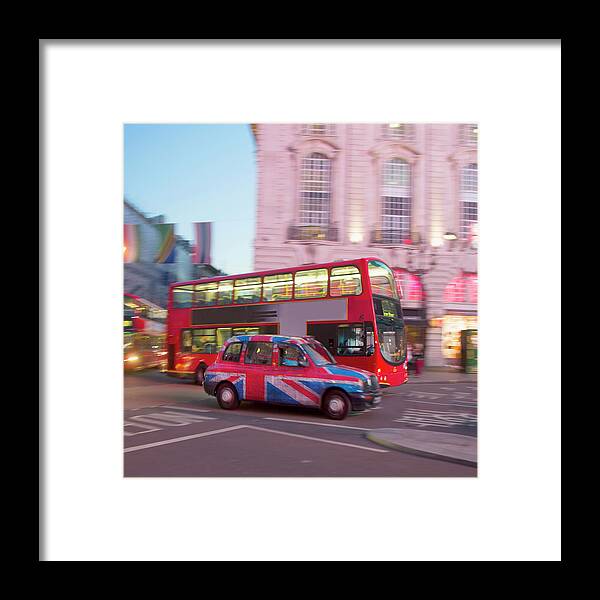Piccadilly Circus Framed Print featuring the photograph Piccadilly Circus, London Cab And Bus by Grant Faint