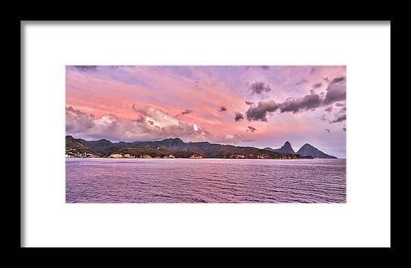 Pink Framed Print featuring the photograph Pink sunset cast on the Pitons in St. Lucia by Craig Bowman