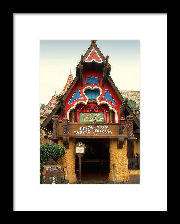 Fantasyland Framed Print featuring the photograph Pinocchio Daring Journey Fantasyland Disneyland by Thomas Woolworth