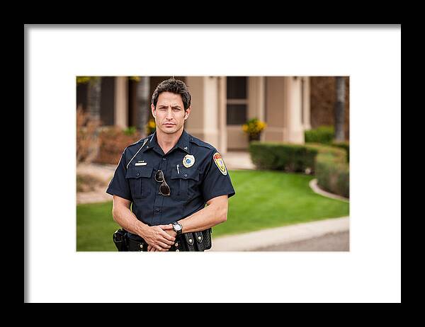 Toughness Framed Print featuring the photograph Police Officer Portrait by Avid_creative