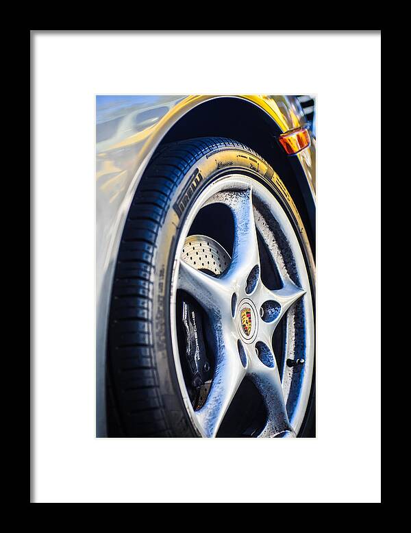 Porsche Wheel Emblem Framed Print featuring the photograph Porsche Wheel Emblem -0006c by Jill Reger