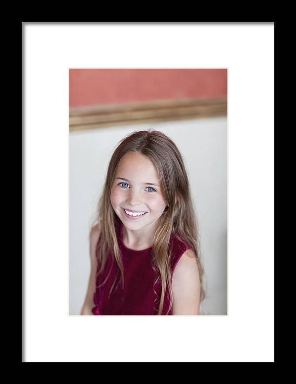 Child Framed Print featuring the photograph Portrait of smiling girl by Sam Edwards